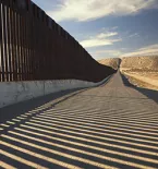 border wall and shadow