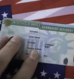 Green card on American flag background