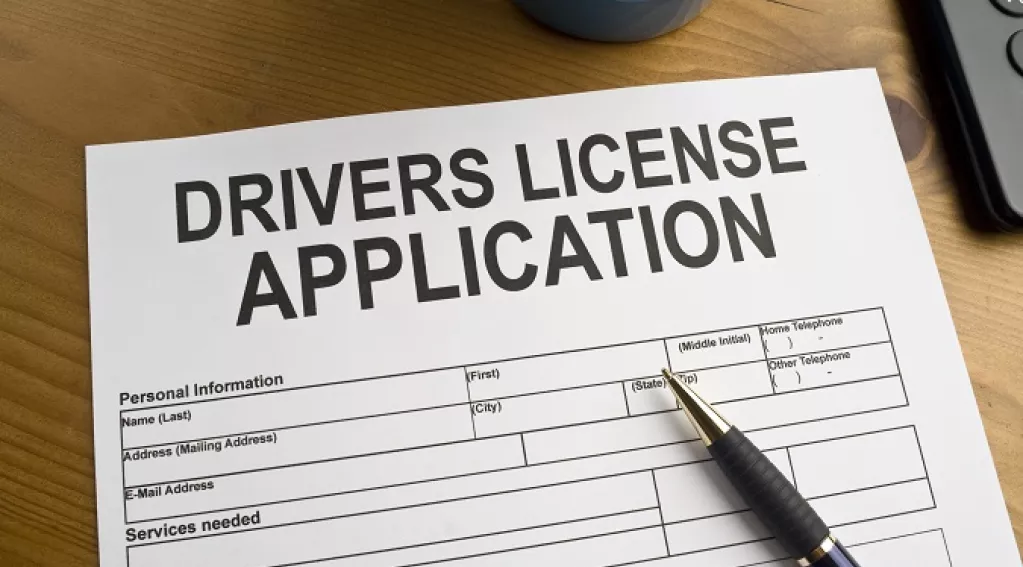 Drivers license application rotator 