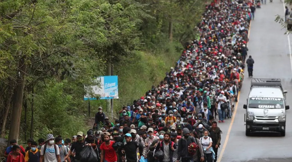 Crowd of people walking near southern border