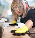 Women cutting wood