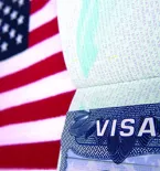 United States flag and VISA sign