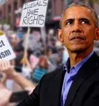 Obama with protesters in the background holding signs that say "Reject Racism" and "Illegals Have Rights"