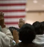 Group of people taking the oath for U.S. citizenship