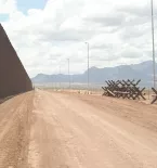 border wall, road barricade