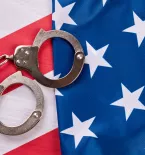 Handcuffs and American flag