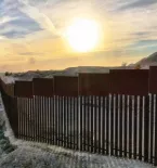 Sunset on the border wall