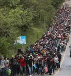 Crowd of people walking near southern border