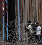 People at border wall