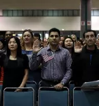 Group of people being sworn in as U.S. citizens