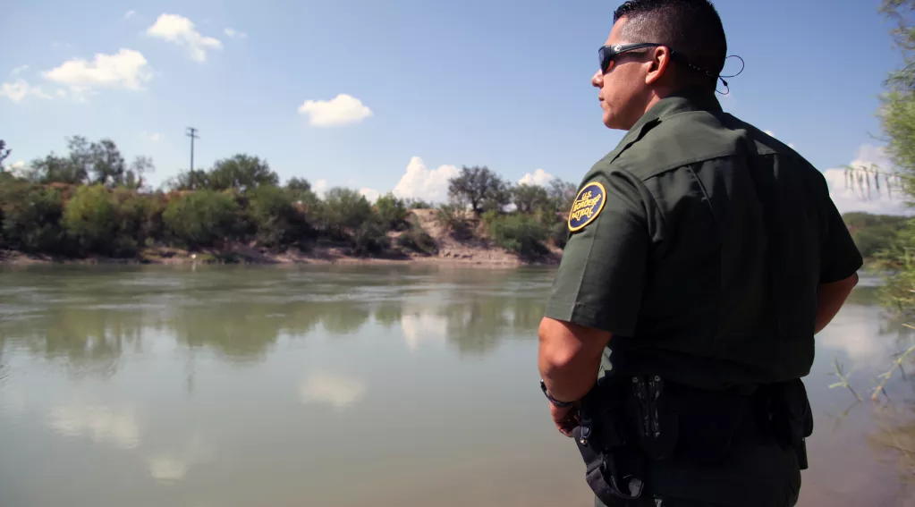 border patrol looking out at water