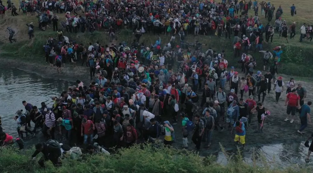 Caravan of Migrants Crossing the Border