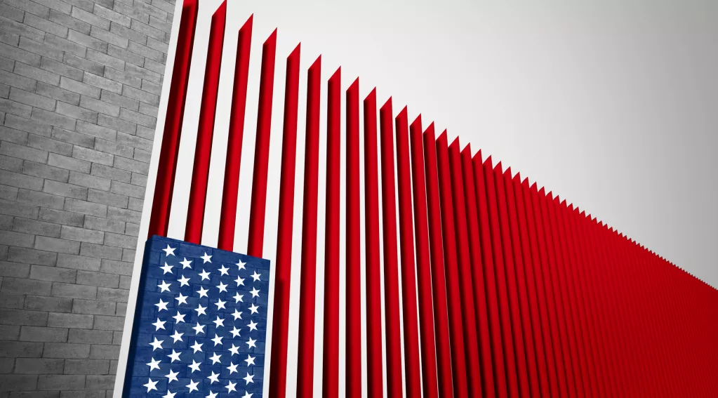 Border wall with American flag