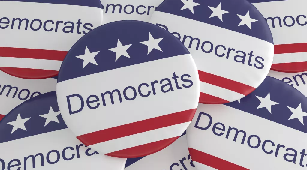 Image of buttons with stars and strips and the word Democrats