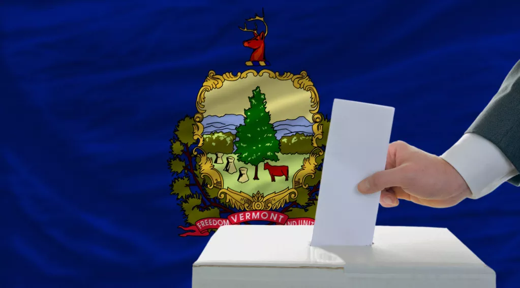 Ballot box with Vermont state flag in background