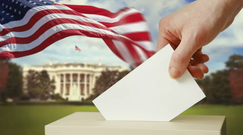 White House with United States flag and voter ballot